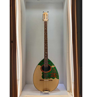 Χειροποίητο 8-χορδο Μπουζούκι με καπάκι από έλατο και πράσινη φιγούρα pegasus |  Μπουζούκια 8-χορδα στο Pegasus Music Store